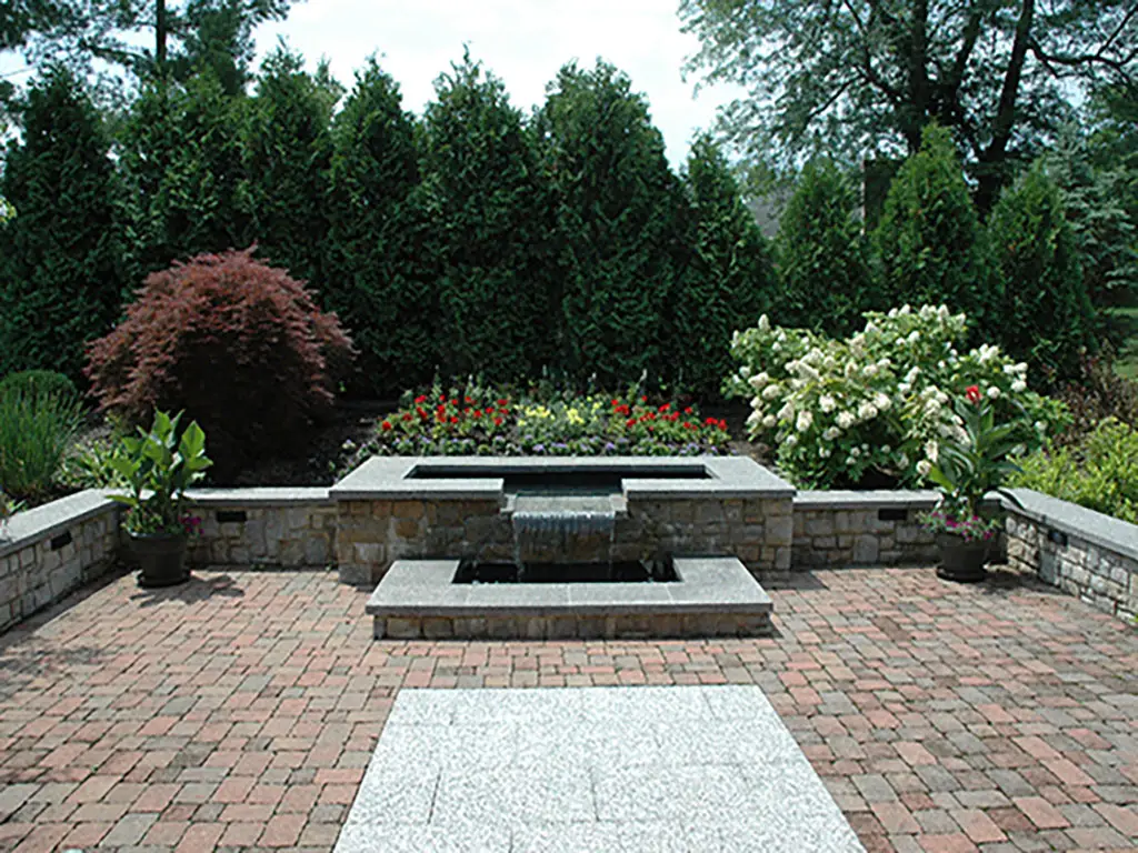 Paver patio, wall, water feature